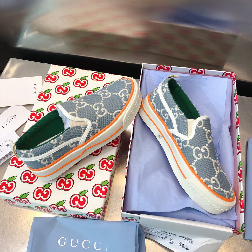 G u c c I baja slip on