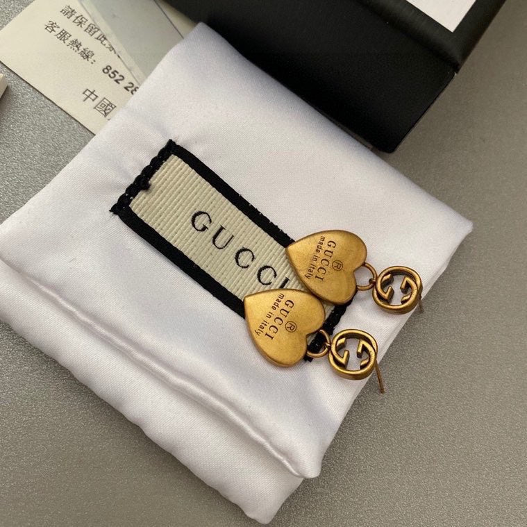 G u c c I earrings