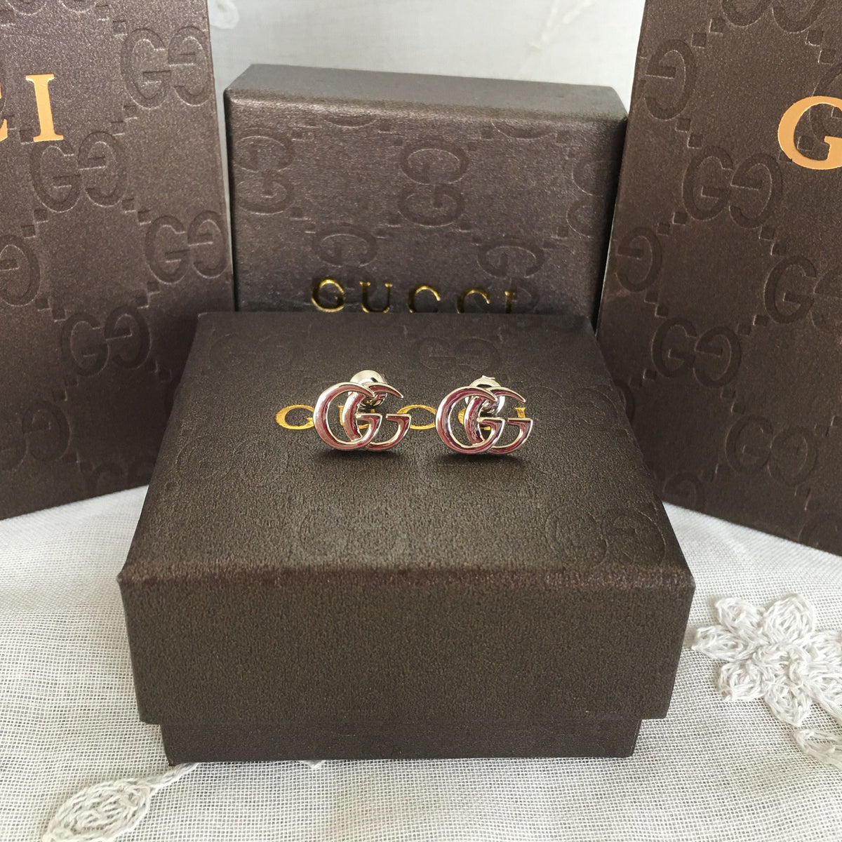 G u c c I earrings