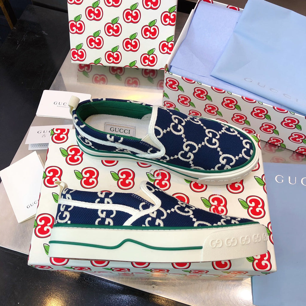 G u c c I baja slip on