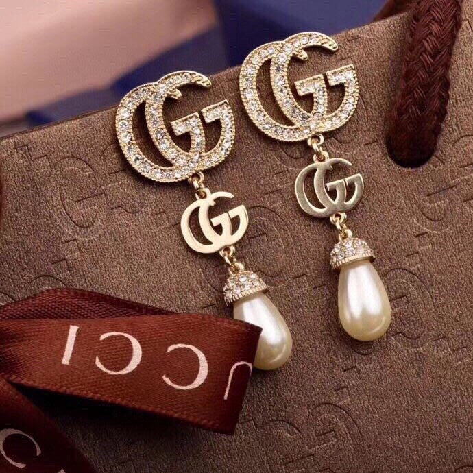 G u c c I earrings