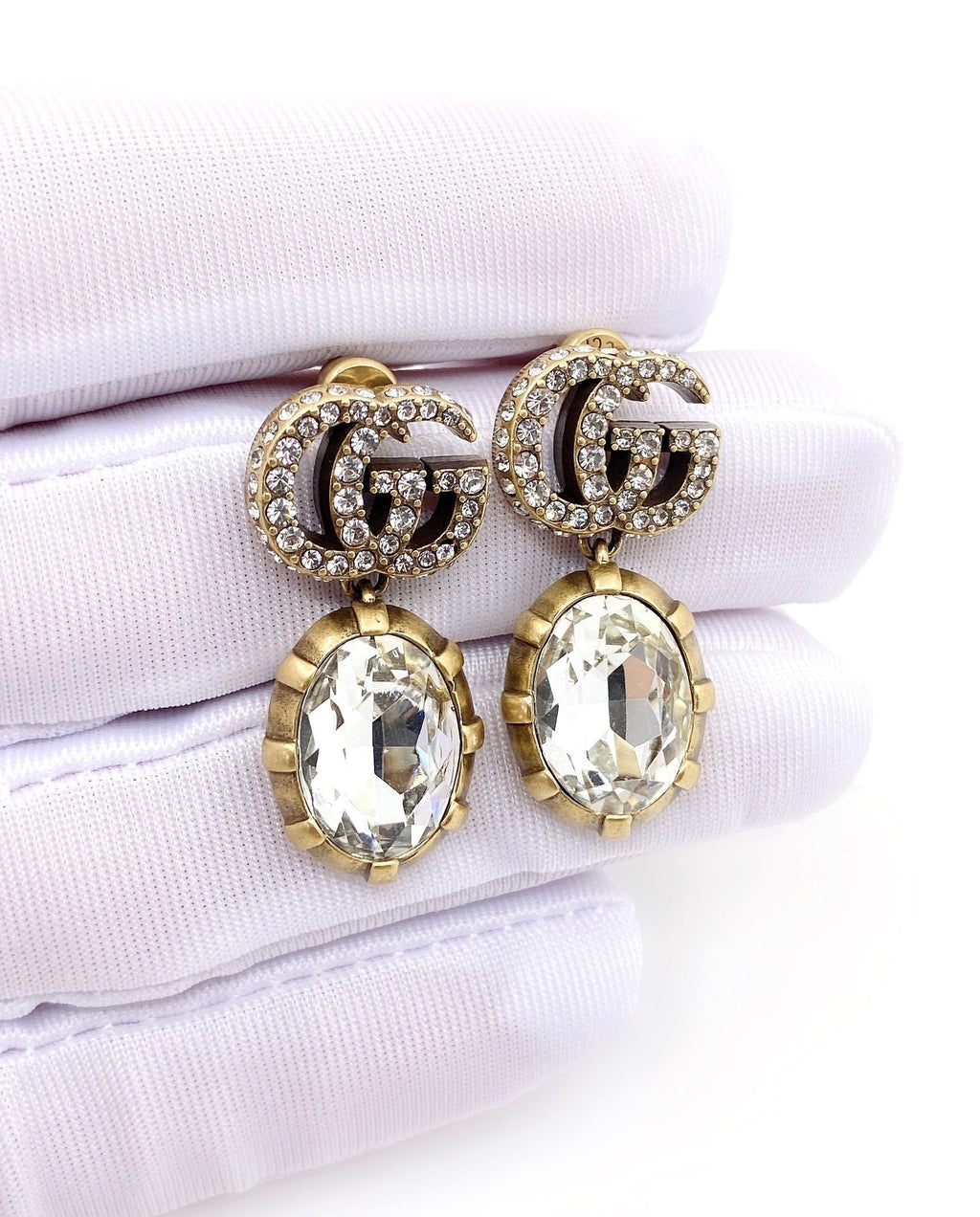 G u c c I earrings