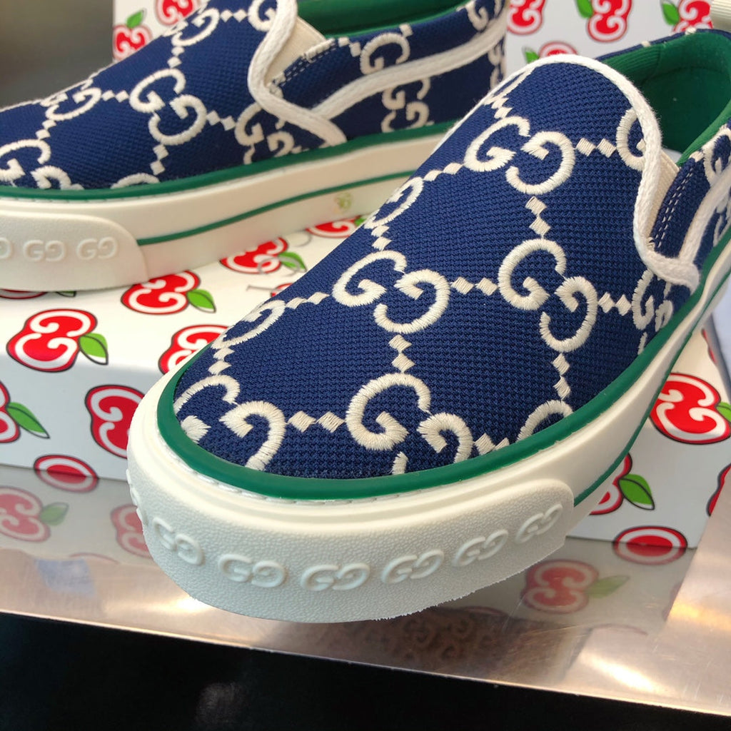 G u c c I baja slip on