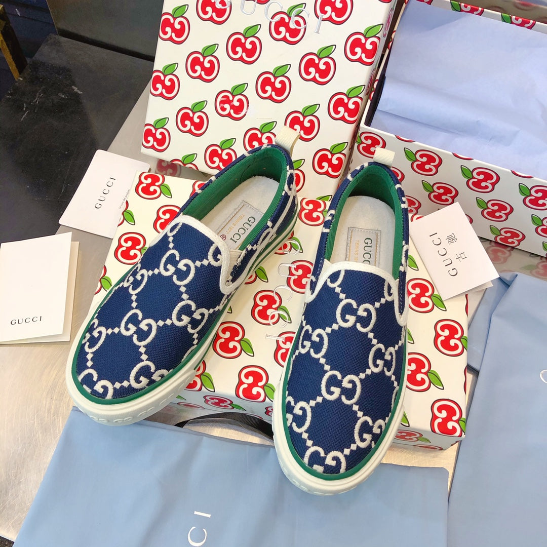 G u c c I baja slip on